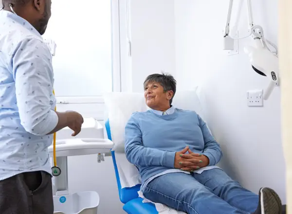 clinical research facility, patient and doctor, consultation, Pan Artists, September 2022,Lalini Carter, Dr Umar Abdullah, Clinical Fellow, ECMT.